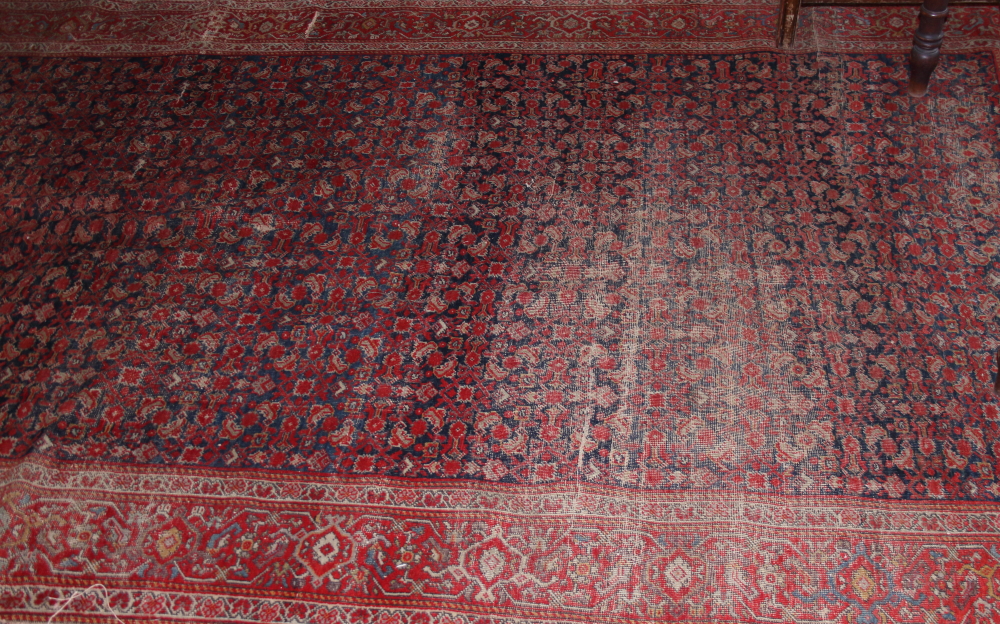 A Feraghan? rug with all-over Herati design on a blue ground, 120" x 69" approx (worn) - Bild 2 aus 2