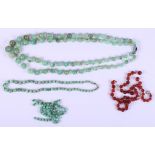 A double strand green hardstone bead necklace, a similar beaded necklace with 9ct gold clasp and two