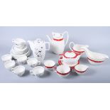 A Midwinter "Red Domino" solo teaset, designed by Jessie Tait, together with four other pieces,