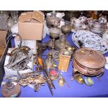 A number of brass and copper oil lamp reservoirs and a copper food warmer