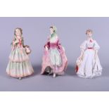 Two Royal Doulton figures, "Clemency" HN1654 and “Suzette" HN1487, and a Royal Worcester figure, "