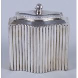 An early 20th century WMF silver plated serpentine rectangular ribbed tea caddy and cover, 5 1/2"