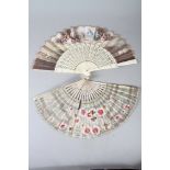 A modern printed vane fan, 8 1/2" long, and a fan with flower decorated vane and painted sticks, 9