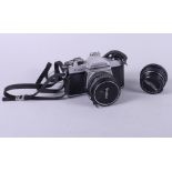 An Asahi Pentax K1000 SLR camera with a 1:2.5 28mm Vivitar auto wide angle lens and a 1:1.7 50mm