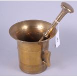 A Continental bronze mortar and pestle, 5 1/2" high