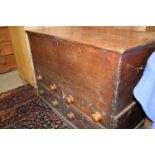 A 19th century oak mule chest, fitted four small drawers, on bracket feet, 39" wide
