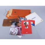 An assortment of Hermes original packaging and instructions