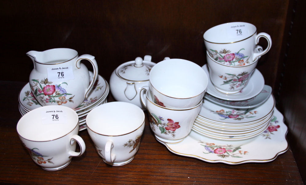 A Wedgwood bone china teaset, painted with insects and floral sprays