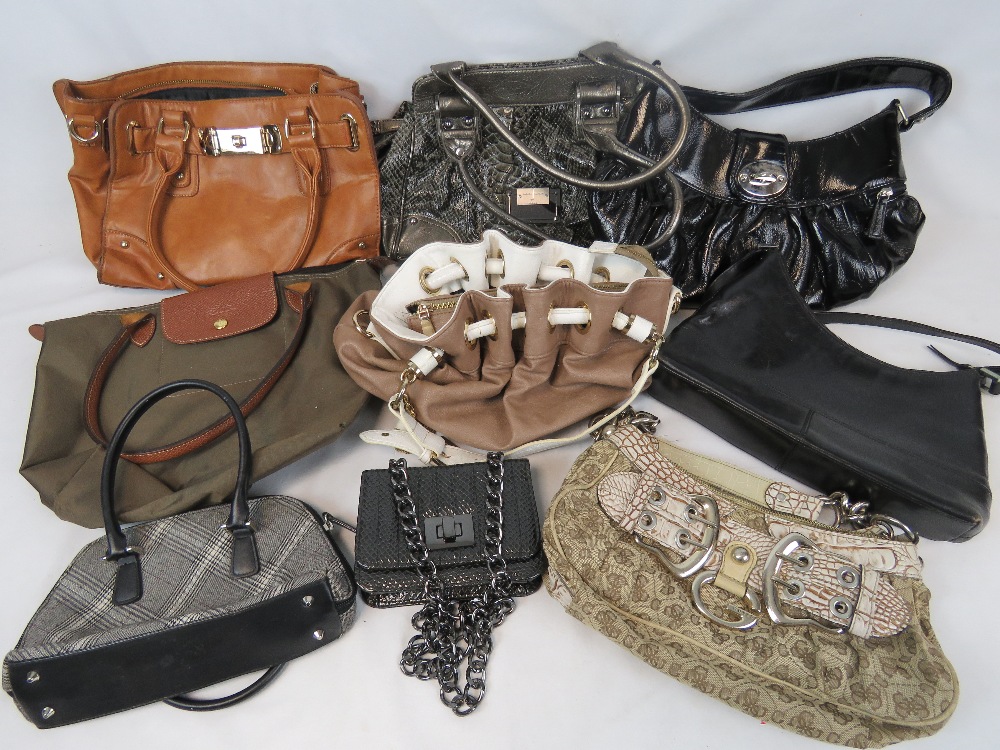 A quantity of ladies handbags including;