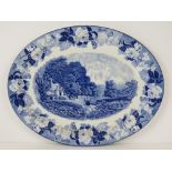 A blue and white Woods & Sons meat plate