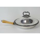 A silver plated breakfast dish with ivor