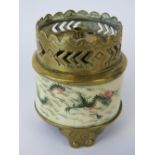 A miniature oil lamp in brass with centr