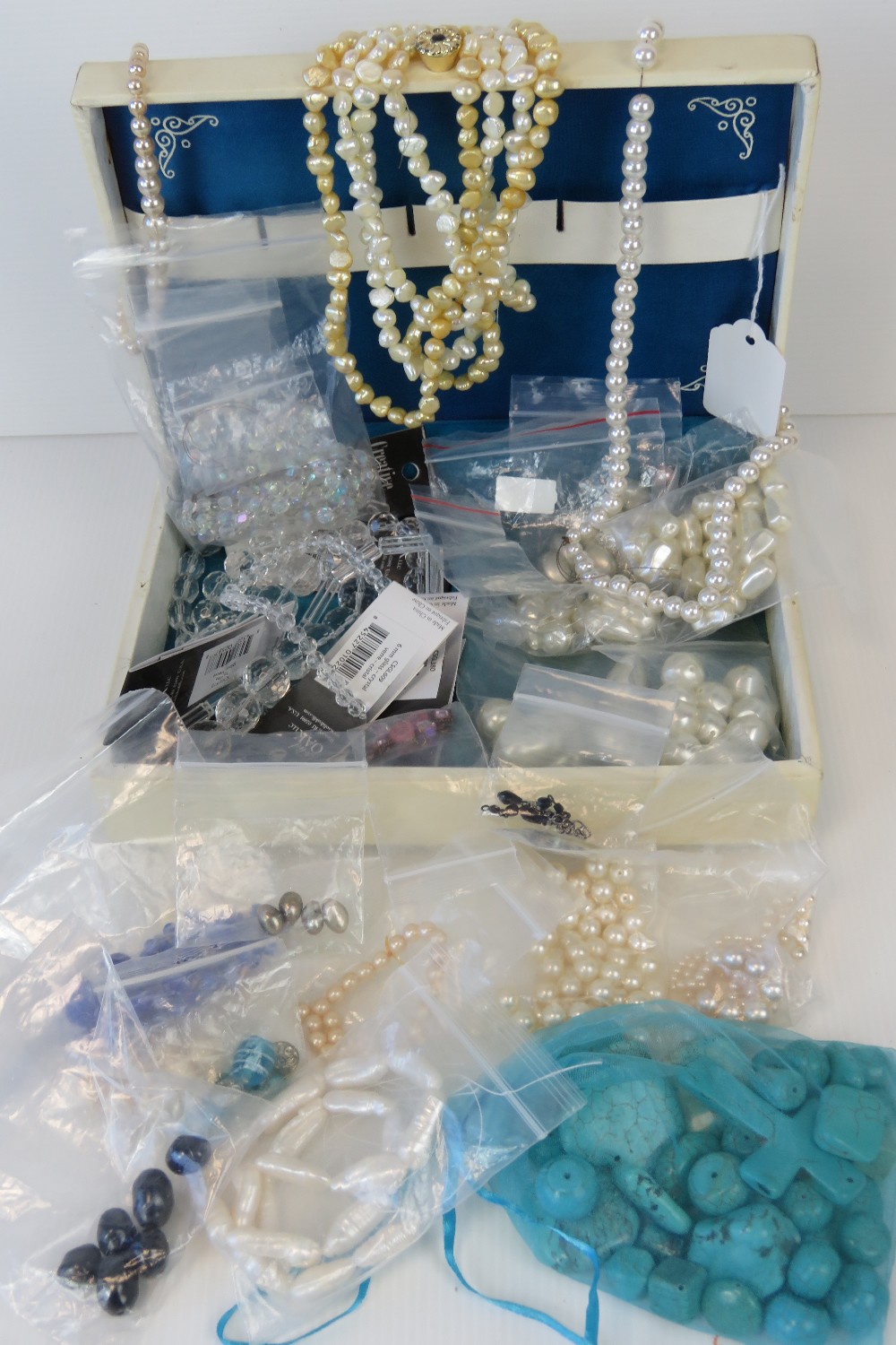 A jewellery box containing a quantity of