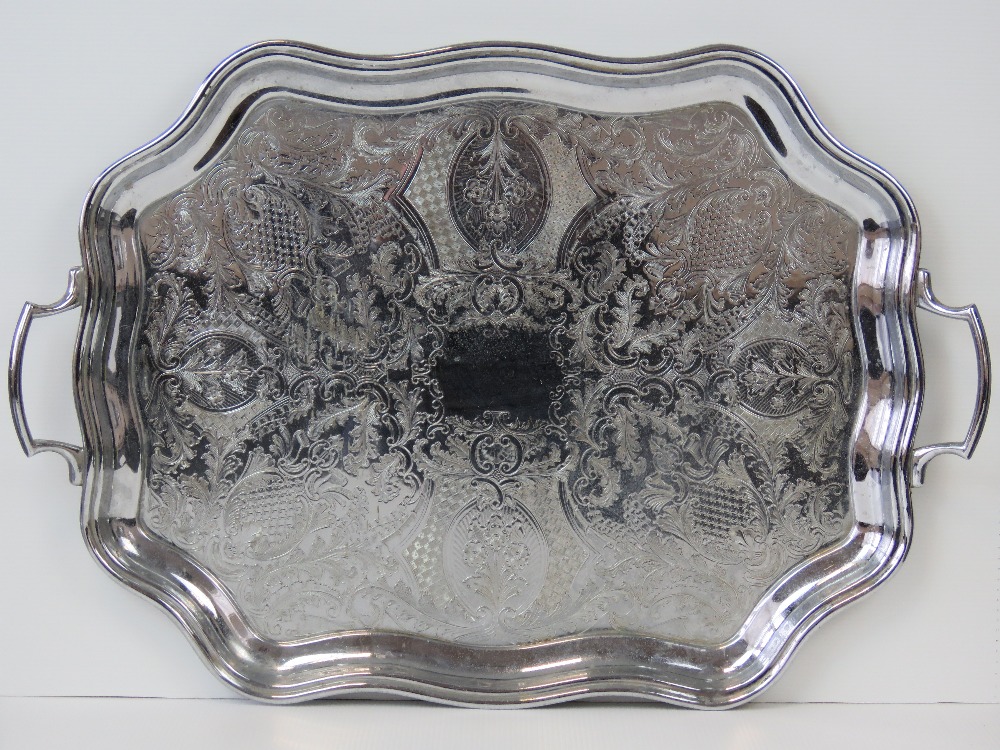 A large twin handled tray of octagonal s