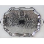 A large twin handled tray of octagonal s