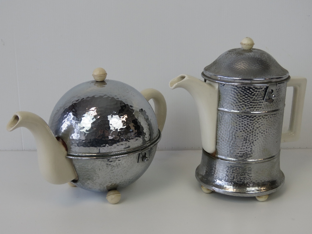 An 'Everhot' heat proof tea pot and simi