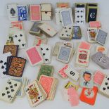 Around 20 packs of assorted playing card
