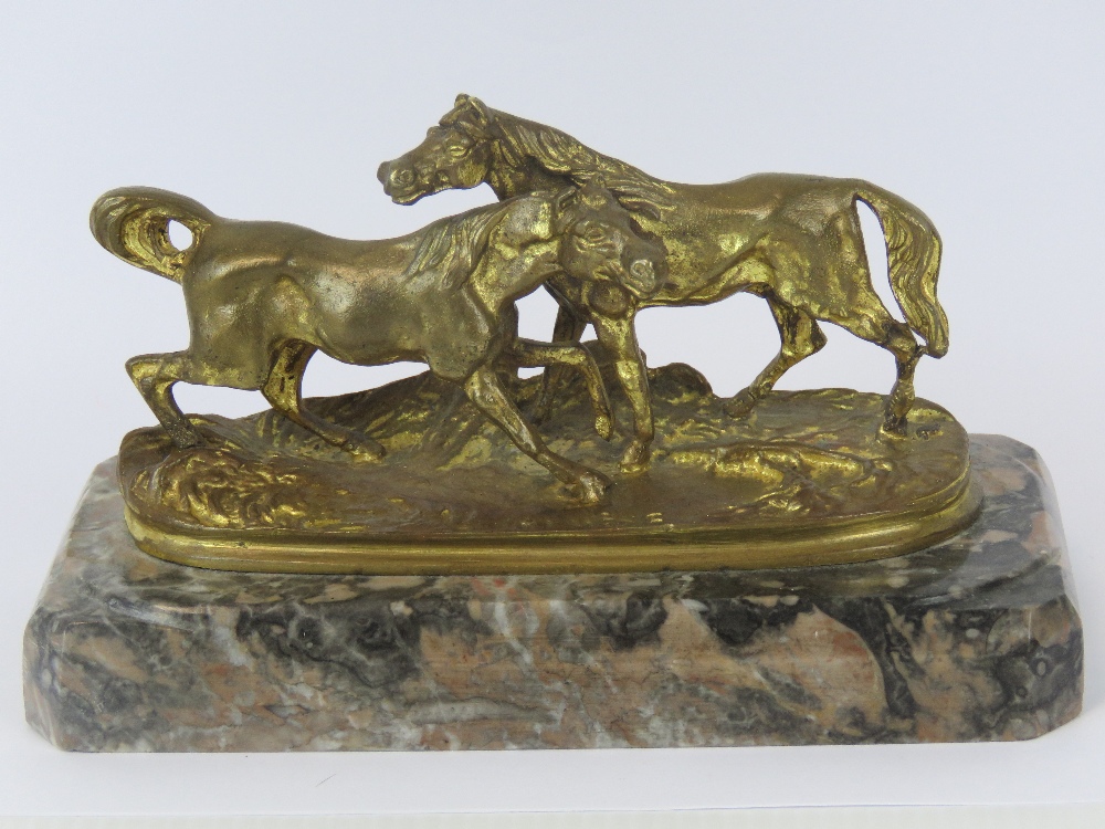 A gilt bronze figurine of two horses aft