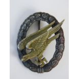 A WWII German Paratrooper 'Gold Eagle' badge.