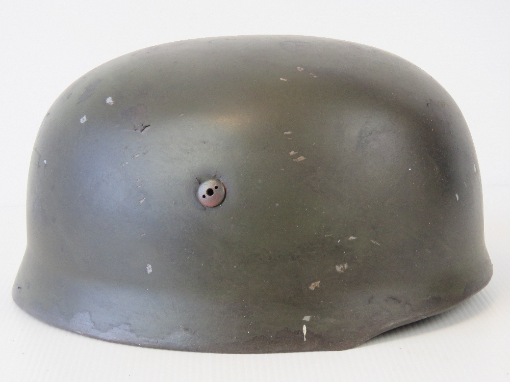 A WWII German Luftwaffe Paratrooper helmet, later painted having applied decal, - Image 2 of 3