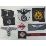 Nine WWII German woven cloth badges.