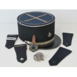 A French Military Kepi hat complete with two badges and pair of shoulder boards, in box.