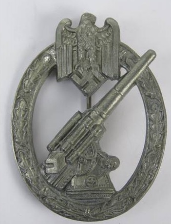 A WWII German Army Flak badge, marked DH.