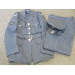 An RAF dress jacket size 13 with cloth badge insignia,