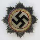 A good replica WWII German 'Gold' Cross badge, '1' stamped on pin.