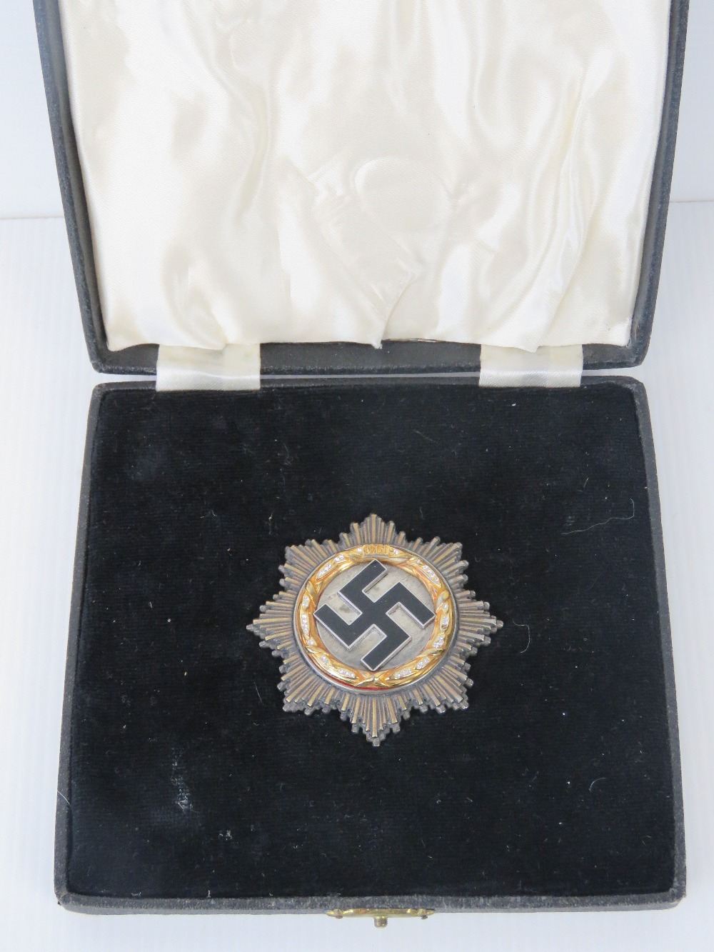 A good replica WWII German 'Diamond Gold' Cross, stamped 800, one paste stone deficient,