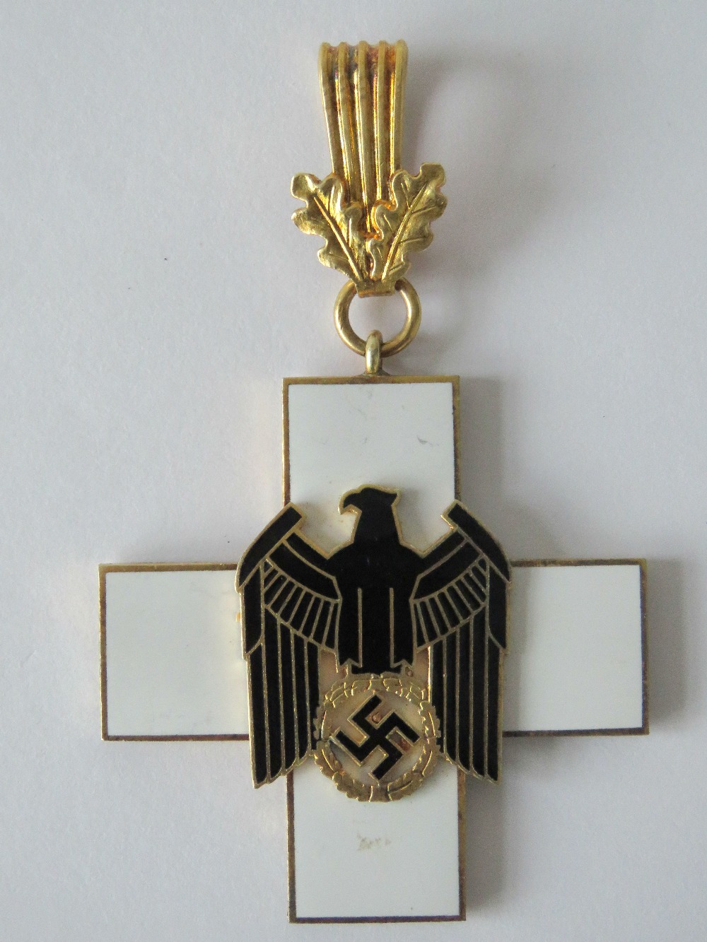 A WWII German 2nd Class Social Welfare Cross medal.