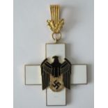 A WWII German 2nd Class Social Welfare Cross medal.