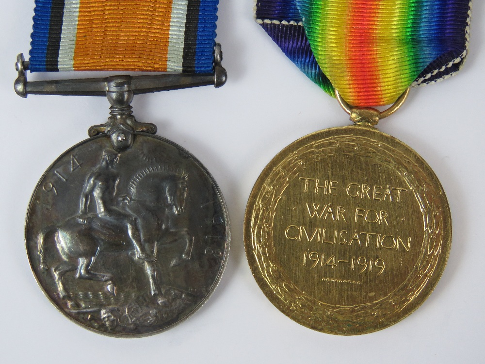 A WWI War and Victory medal group, inscribed for PTE. C.H. Mitchell Lan.Fus. - Image 2 of 3