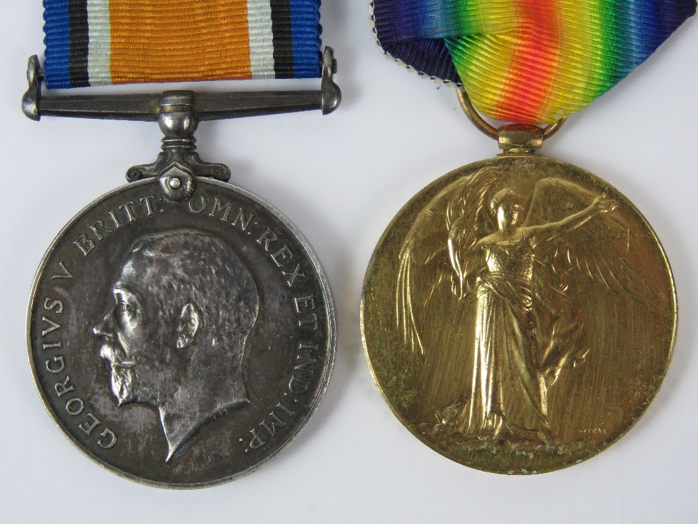 A WWI War and Victory medal group, inscribed for PTE. C.H. Mitchell Lan.Fus.