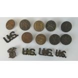 A quantity of WWI US badges in good condition. Fourteen items.