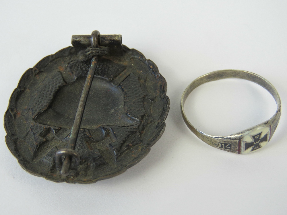 A WWI German 'Black' Wound badge, and a white metal and enamel 1914-16 ring stamped 800. Two items. - Image 2 of 2