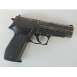 A deactivated (EU Spec) Sig P226 Semi Au