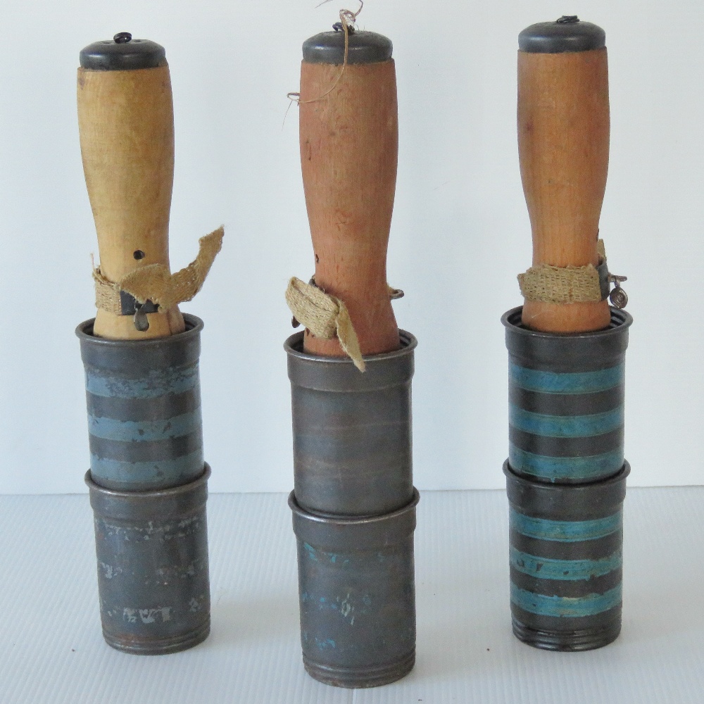 Three Hungarian M42 practice grenades.