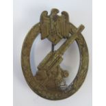 A WWII German Flak badge, small amount o