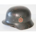 A WWII German RAD Party helmet, later pa