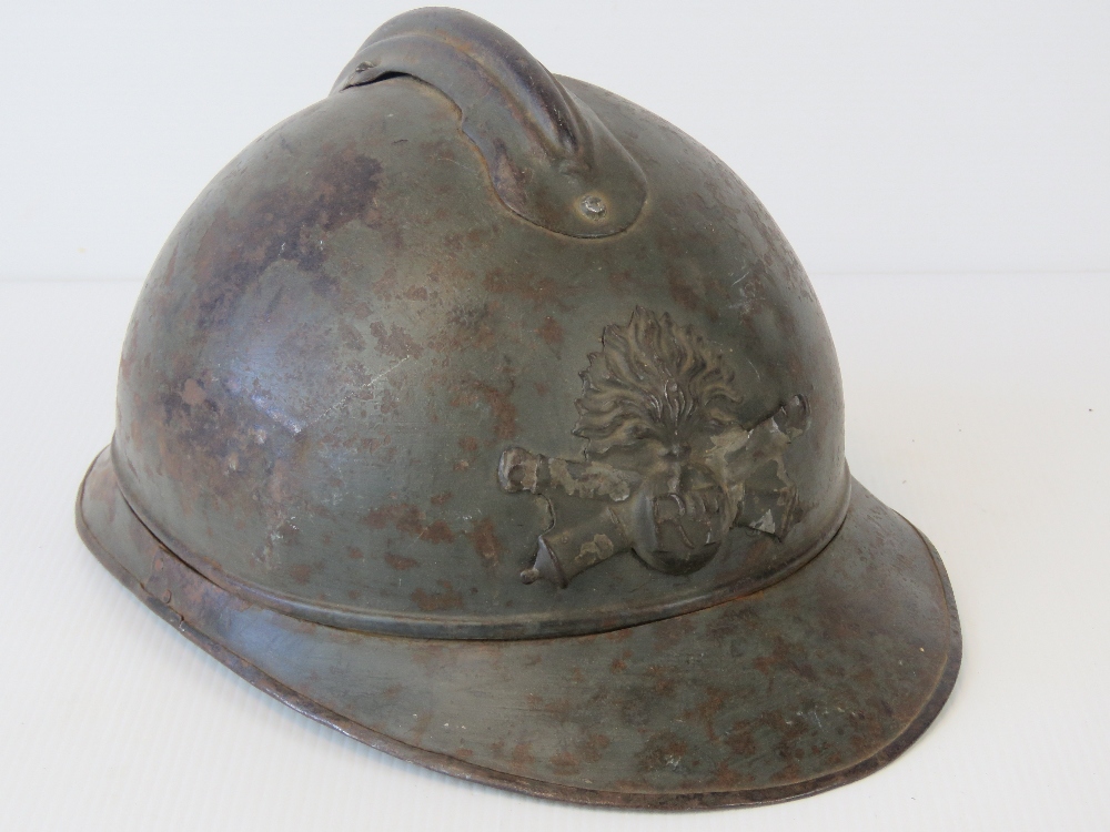 A WWII French Adrien helmet with liner.