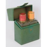 A delightful vintage travelling perfume suite,