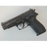 A deactivated (EU Spec) Sig P226 Semi Automatic 9mm military pistol, serial number U165592.