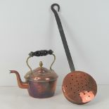 An English made copper kettle, standing 21cm high. Together with a copper chestnut roasting pan.