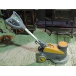 A Vaclensa commercial floor polisher.