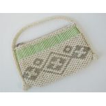 A vintage beaded evening bag c1940s, slightly a/f.