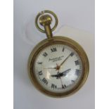 A brass cased 20th century spherical pocket watch marked 'Aeroplane Livre' to the face and