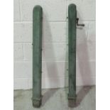 A pair of vintage wooden tennis net posts complete with hand wound integral tensioner, 105cm high.