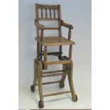 An Victorian child's metamorphic beechwood high chair.