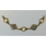 A vintage silver filigree Italian five panel micromosaic and cameo bracelet, stamped 800, 19.